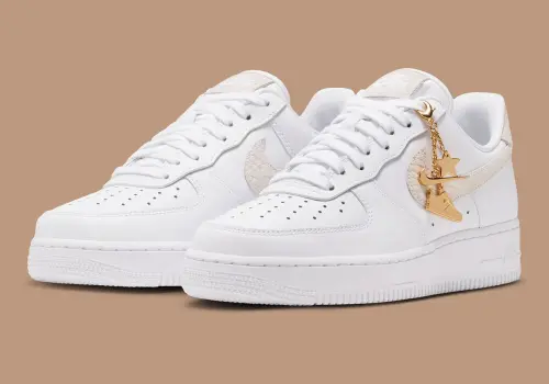 Nike добавляет змеиную кожу и золотые брелоки в женские Air Force 1