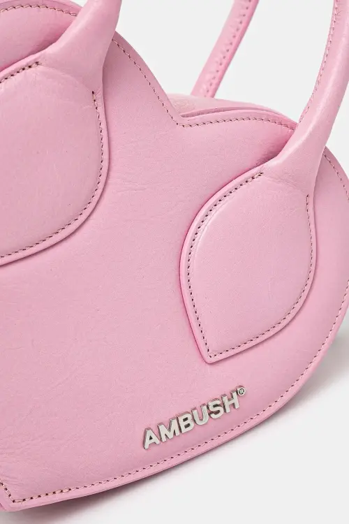 Кожаная сумочка Heart Top Handle Bag цвет розовый